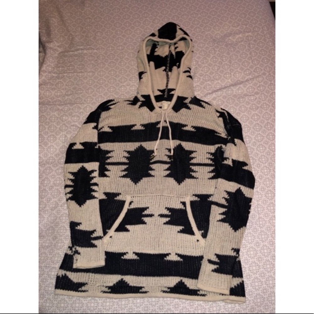 black and cream colored printed hoodie